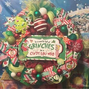 The Grinch front door wreath featuring Cindy Loo Who